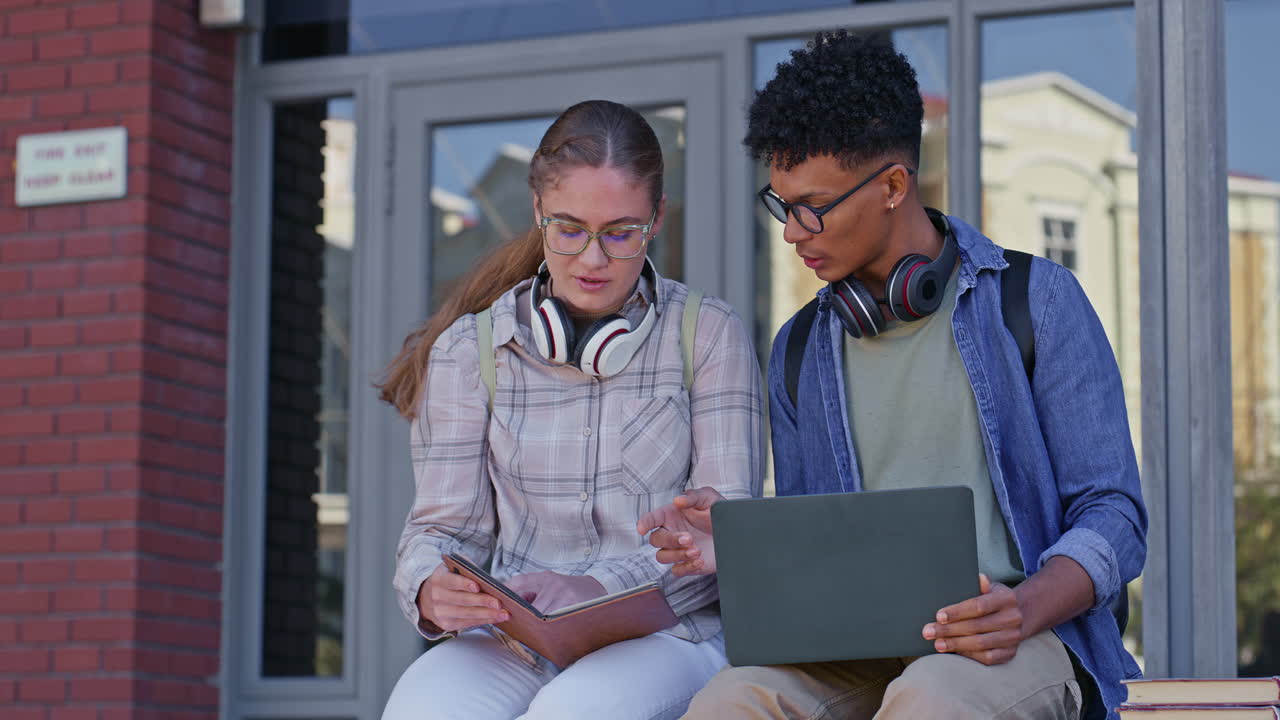 Students studying together on campus