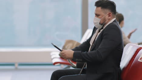 businessman in departure lounge