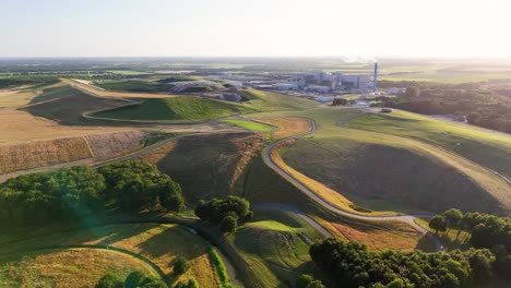 aerial view of a reclaimed landfill site with surrounding landscape