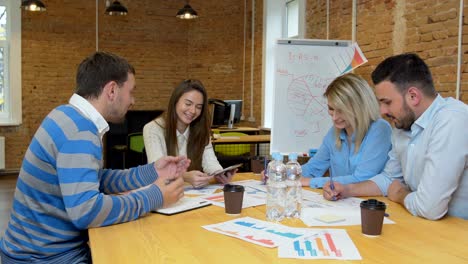 business team meeting involved diverse people participating in creative sustainable ideas steadicam shot across boardroom table shared work space