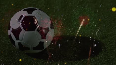 Animation-Von-Feuerwerk-über-Fußball-Auf-Schwarzem-Hintergrund