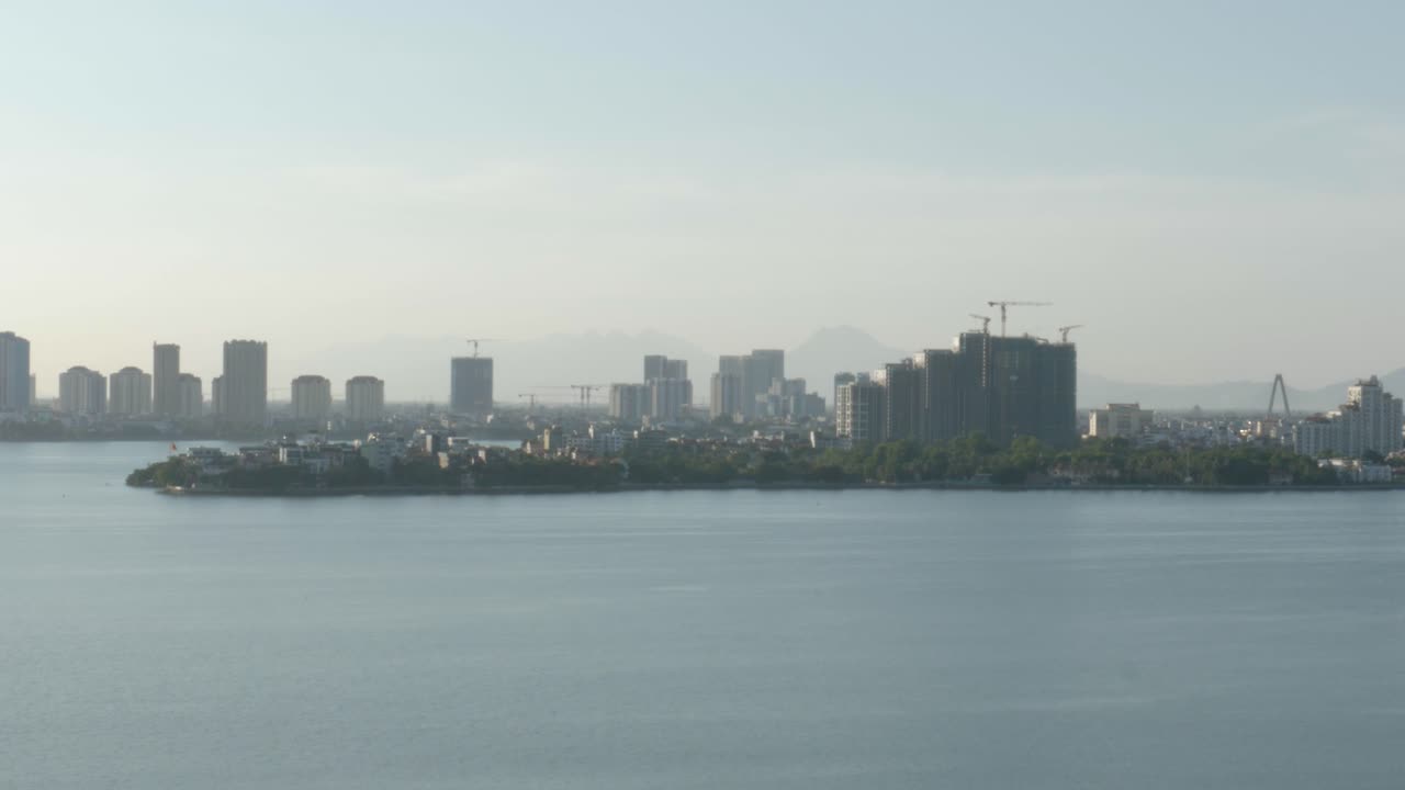 Landscape View Of Hanoi Skyline From Tay Ho Lake In Tay Ho District, Vietnam. static shot
