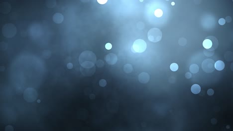 abstracto bucle sin costuras partículas azules luces bokeh y nube. luz de navidad fondo de textura. gráficos de movimiento. fondo festivo. partículas flotantes 4k multicolores en imágenes de bucle sin fin negro.