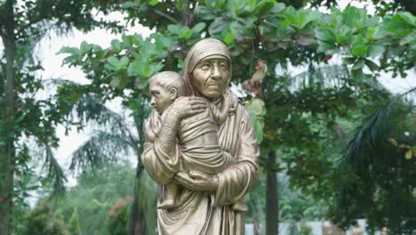 various statues in the park inside bandel church