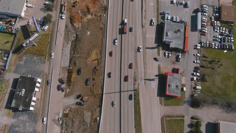 Aerial-of-cars-on-610-South-freeway-in-Houston,-Texas