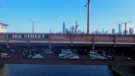 close up of chicago's 18th street sign on bridge