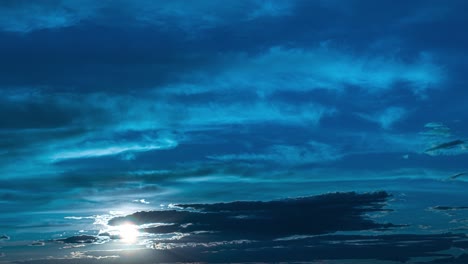 the bright sunshine on the beautiful dark blue sky background. time lapse