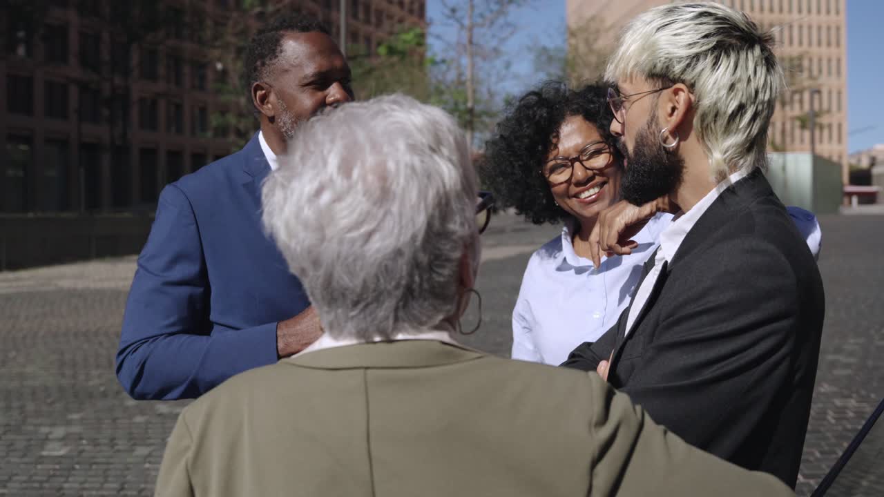 Group of diverse business people meeting outdoors