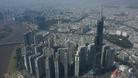 aerial view of landmark central park, saigon river and ho chi minh city skyline, vietnam on a sunny day