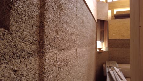 close-up of hempcrete wall from the side passing by