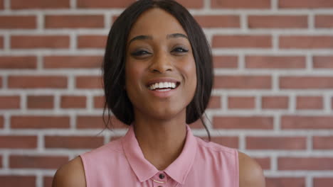 portrait attractive young african american woman laughing cheerful looking confident enjoying successful lifestyle independent black female slow motion close up