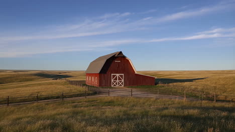 a red barn in a rural landscape