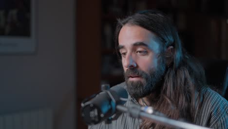 man recording a podcast