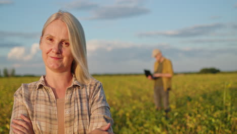 woman farmer in soybean field