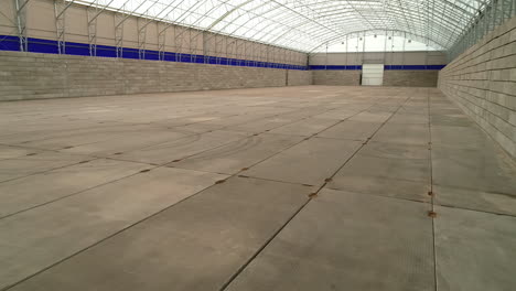 empty huge grain warehouse, dolly forward view