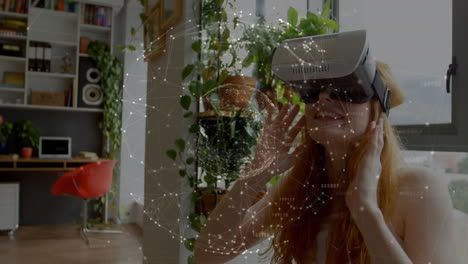 animación del globo con una red de conexiones sobre una mujer caucásica que usa auriculares vr