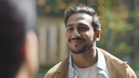 Close-Up-Of-Muslim-Couple-On-Date-Meeting-And-Talking-On-City-Street-Together-3