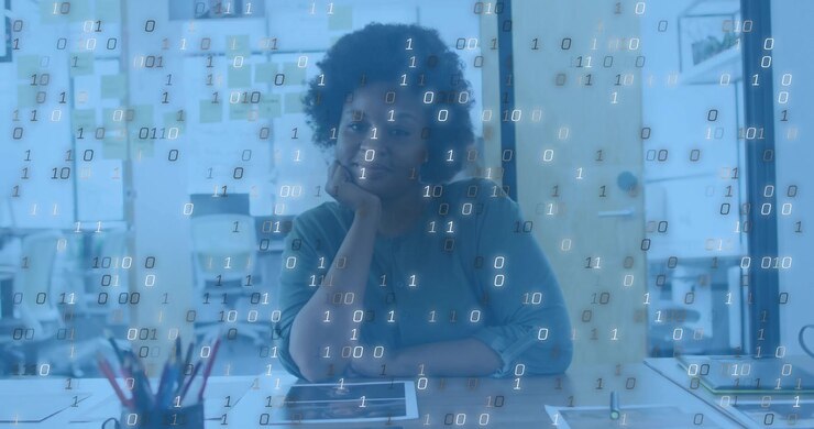 Office professional contemplating at desk and initiating binary stream enhancing tech scene