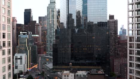 nyc buildings of downtown city timelapse time passing turning to night columbus circle