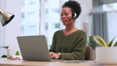 Confident-black-female-call-centre-agent-talking