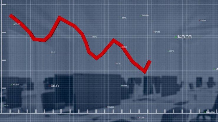 Animation of red graph processing data over computers on desks at office
