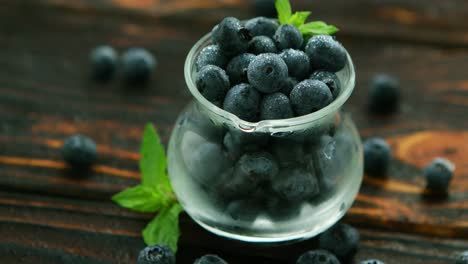 Jug-full-of-blueberry-with-green-leaf