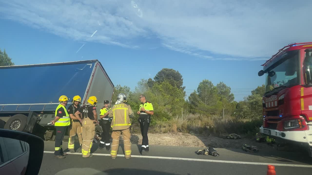 Truck Accident on Highway with Firefighters