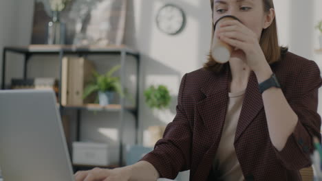 woman working on laptop in office