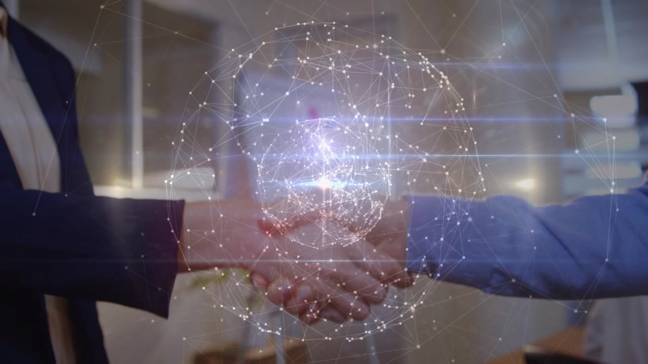 Women biz partners shaking hands in office, touch sparking hologram pulsing over hands sealing deal