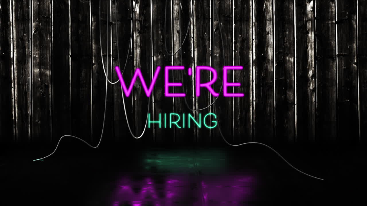 Animation of we're hiring text in pink and blue neon letters on black background