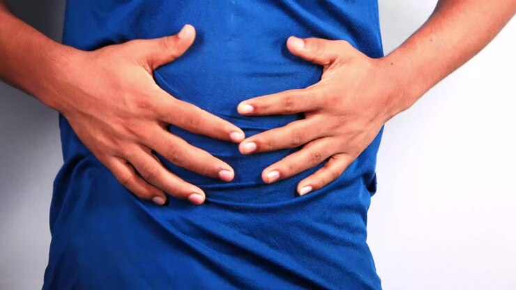 Person experiencing abdominal pain