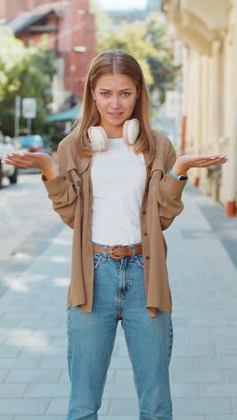 confused caucasian woman feeling embarrassed about ambiguous question having doubts on city street