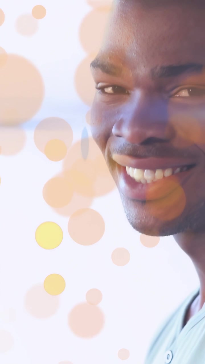 Man tapping tablet, activating bokeh UI, pulling back, smiling, showing tech for creators