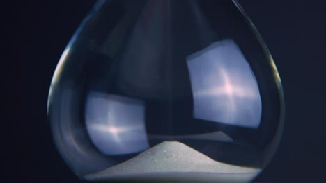 [Camera Used: Canon C300] An hourglass reflecting the passage of time