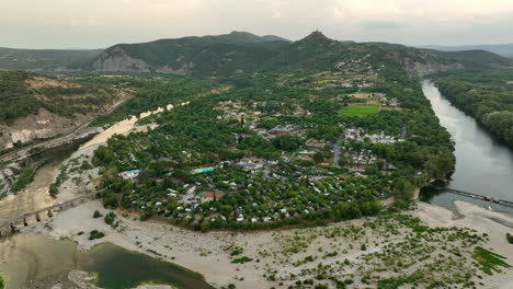 aerial view of camping site sandaya in bend of ardèche river in france