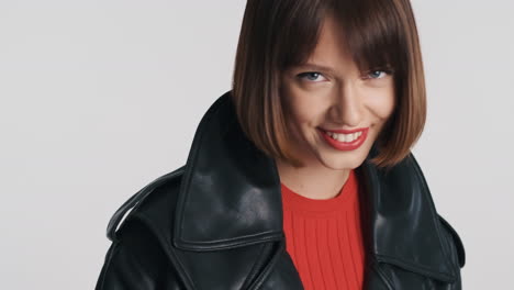 Happy-and-smiling-girl-with-leather-jacket-in-studio