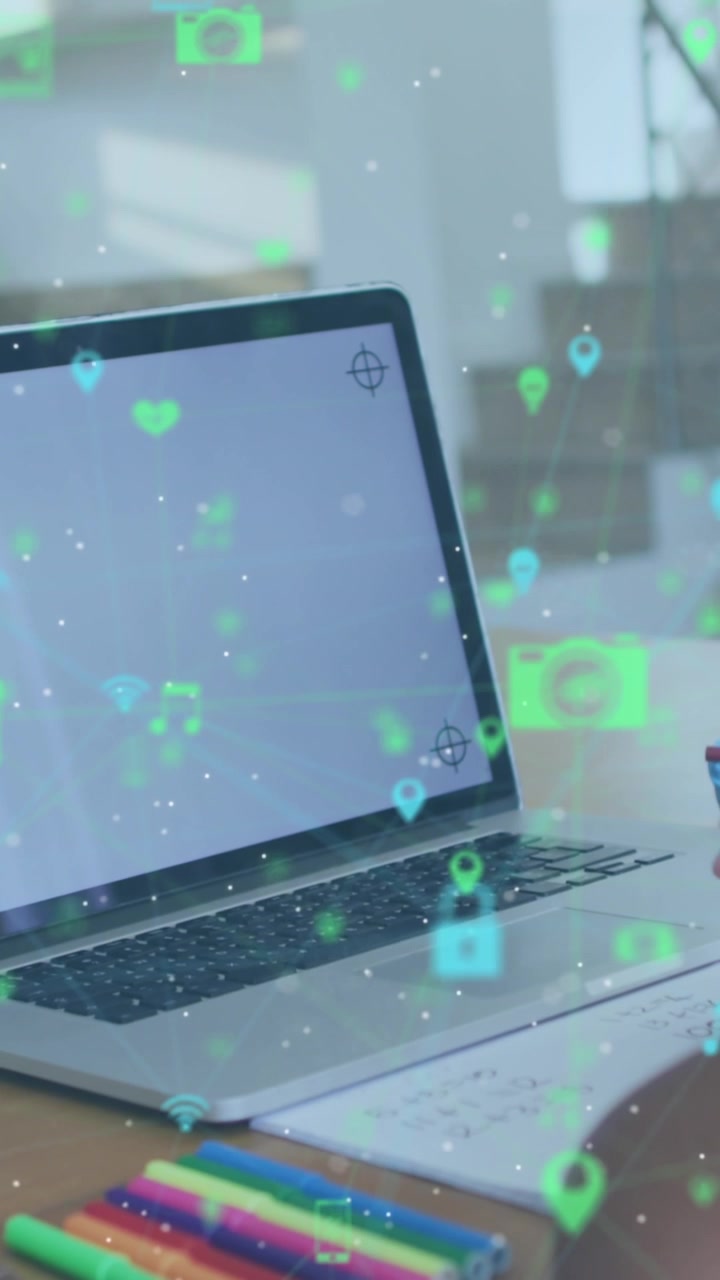 Animation of network of connections with icons over girl using laptop with copy space
