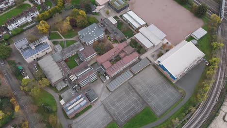 comprehensive aerial view of ellen wilkinson school campus showing educational facilities and sports grounds, ealing, london, uk, october 2024
