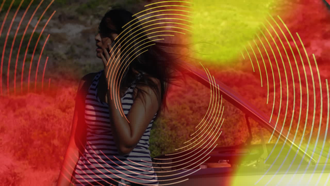 woman standing beside open car trunk, showcasing circular graphic overlays for automotive marketing