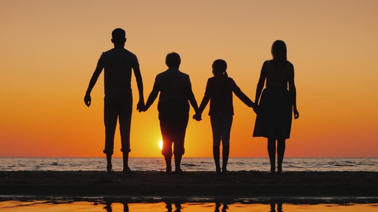 Friendly Multi-Generational Family Together Raise Their Hands Up