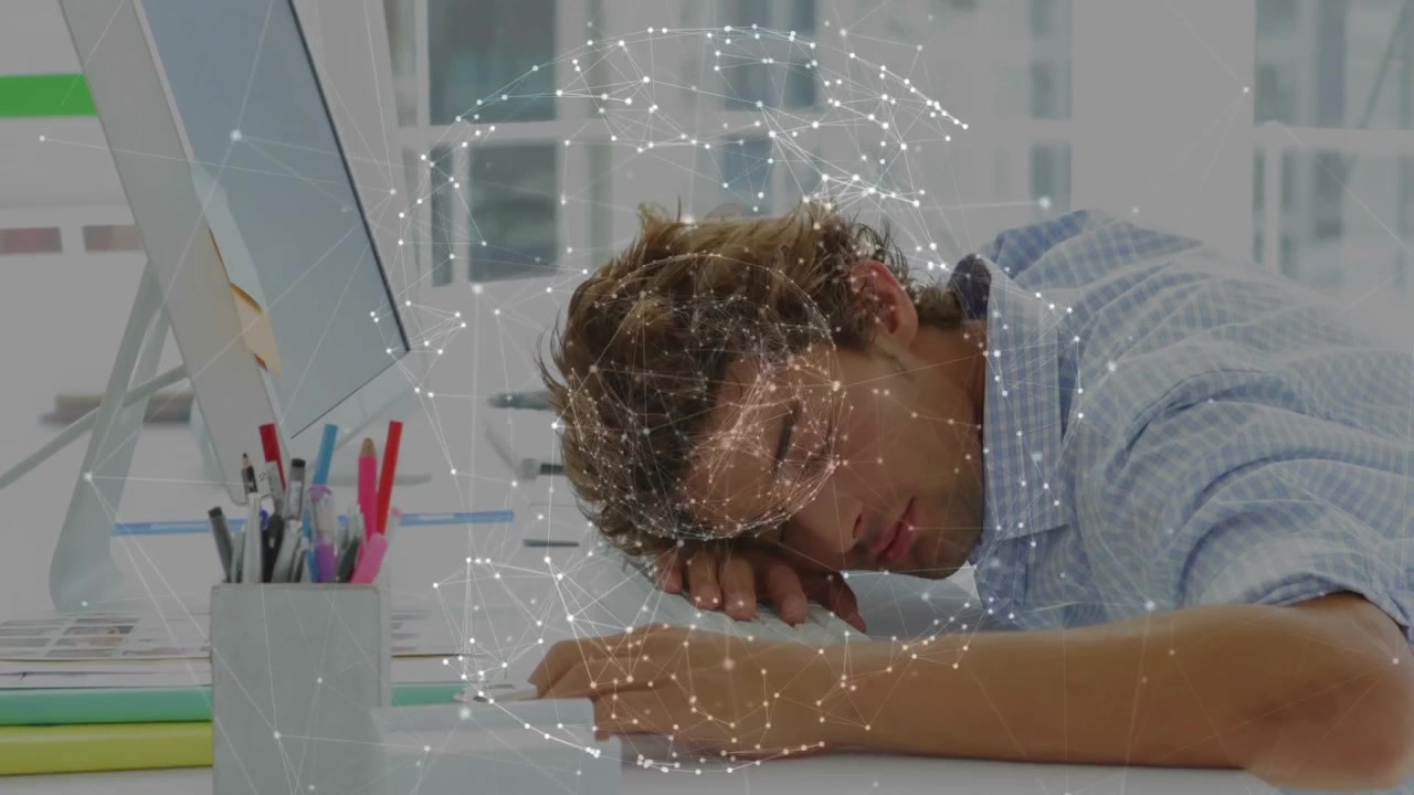 Office worker leaning on desk network swirling causing dozing and rubbing eyes from tech fatigue
