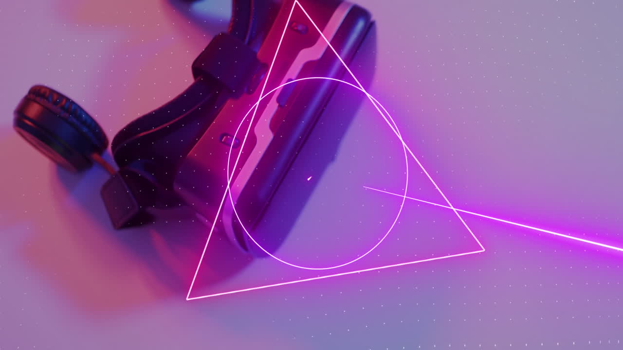 Animation of neon shapes over video game computer pads
