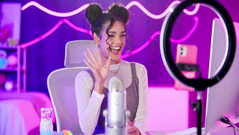 young woman vlogging with ring light and microphone