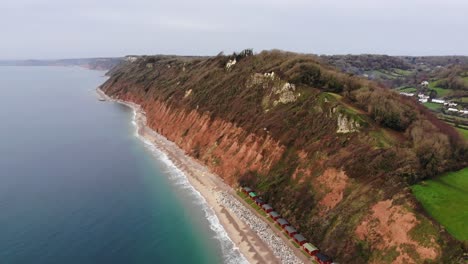 aerial shot of the cliffs at branscombe highlighting the beautiful calm sea of lyme bay devon england uk