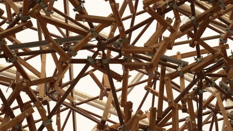 intricate wooden roof structure with exposed beams and joints