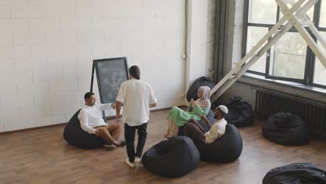 colleagues sitting in coworking