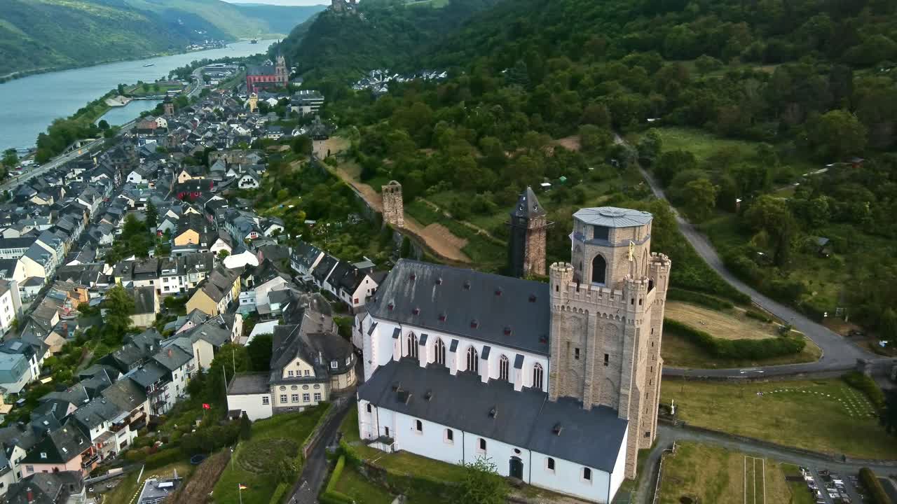 Historic military church and fortified town wall in medieval Oberwesel, Drone reveal