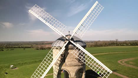 chesterton white stone cylinder domed tower windmill aerial view pull away revealing rural countryside