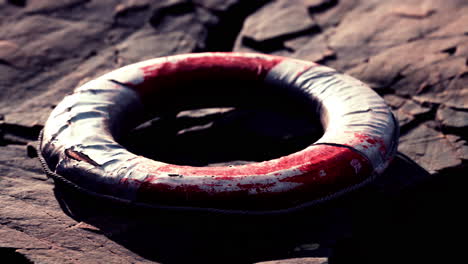 very old abandoned grungy lifebuoy