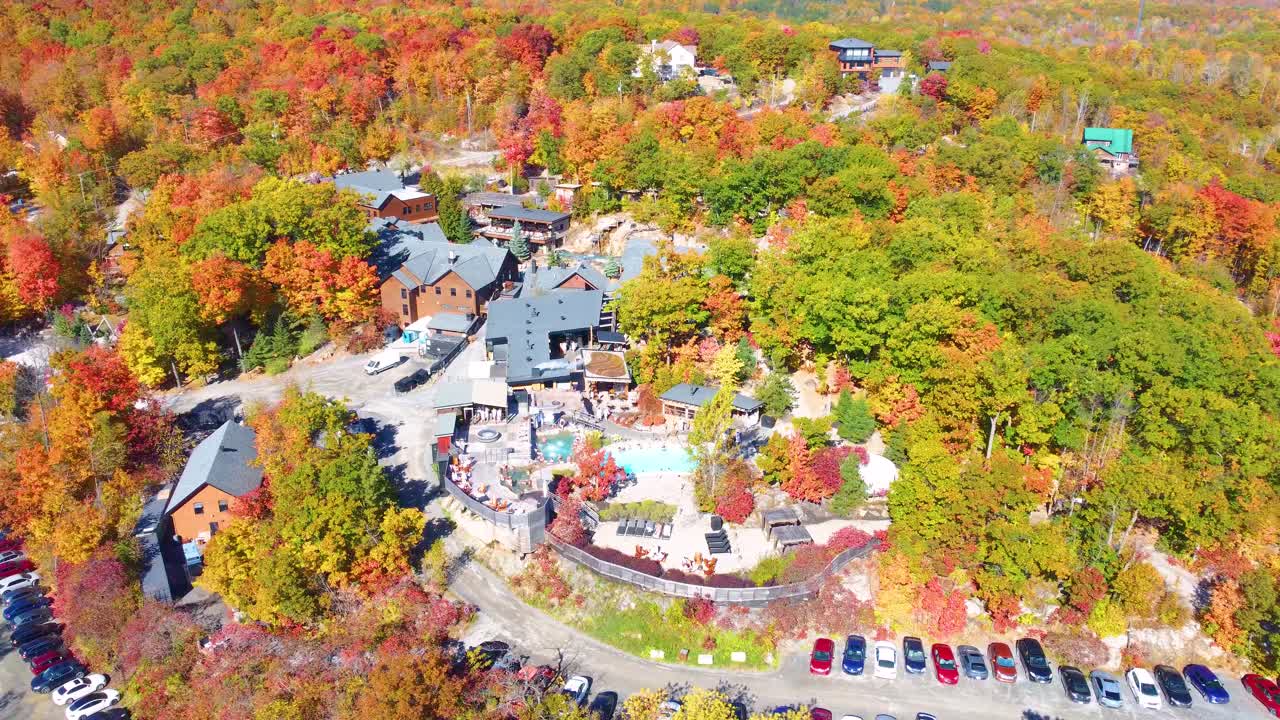 Region of Estrie holiday resort as relaxation place at the nestled in a vibrant autumn scenery, Quebec, Canada.